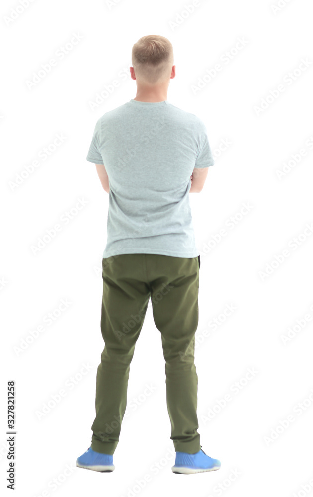rear view. confident casual guy looking at white screen rear view. confident casual guy looking at white screen