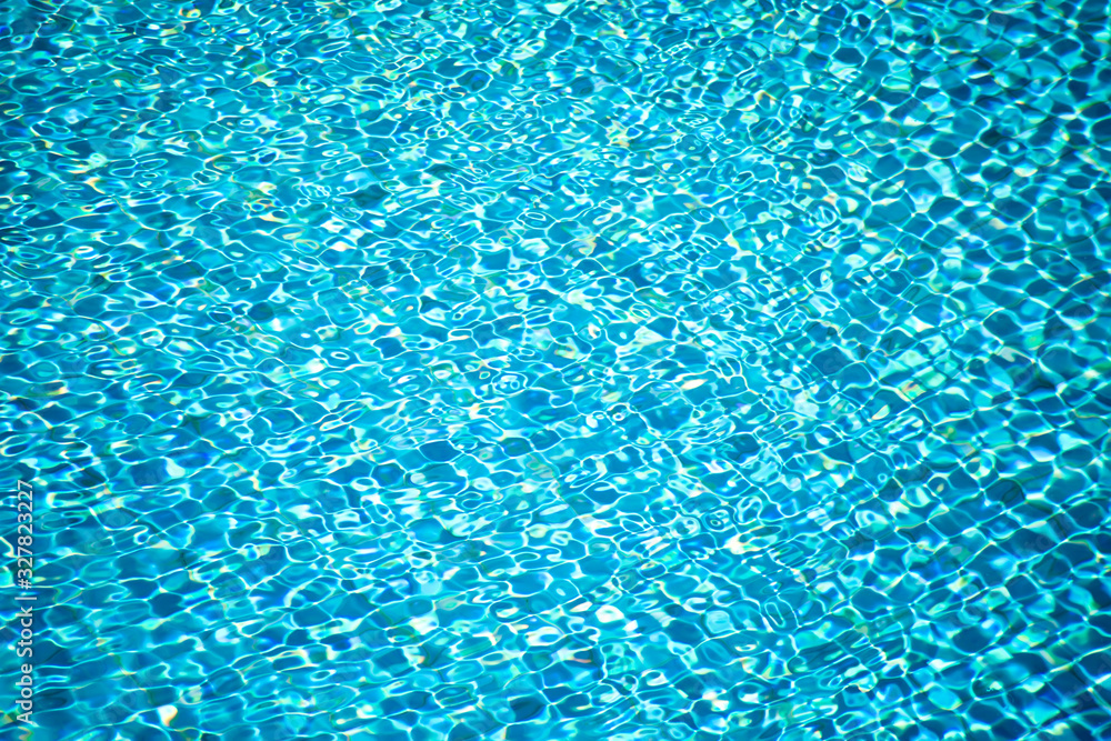 A surface of water in swimming pool. Aqua background