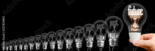 Plakat Light Bulbs with Past and Future Concept