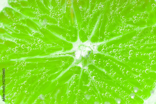 lime fruit close-up, background in water, under water. background, texture