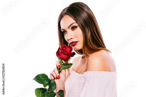 Beautiful woman model holiding a red rose photo