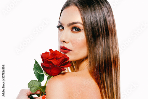 Beautiful woman model holiding a red rose photo