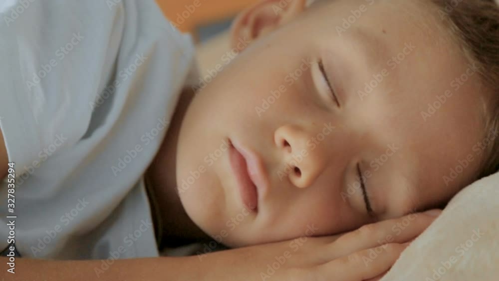 A child sleeps in bed,full hd video A child sleeps in bed,full hd video