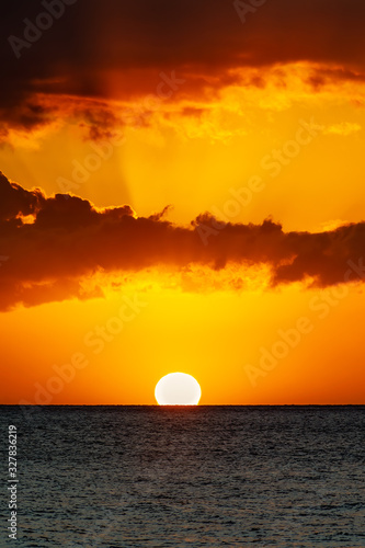Fototapeta Naklejka Na Ścianę i Meble -  Big Orange Sunset in Maui Hawaii