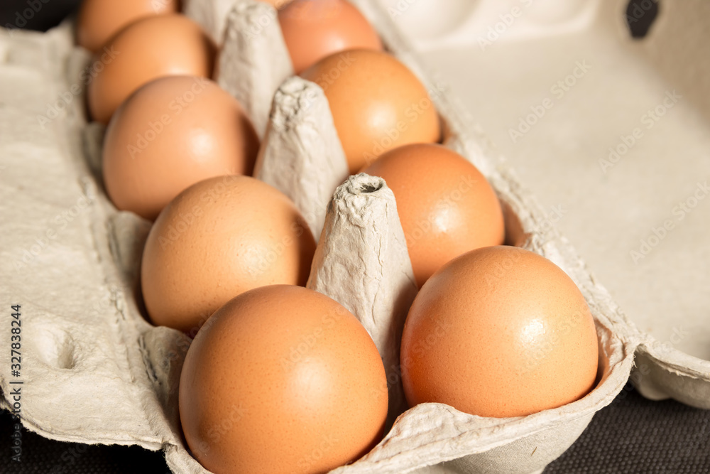 Chicken eggs in a cardboard box. Bio food. Chicken eggs in a cardboard box. Bio food.