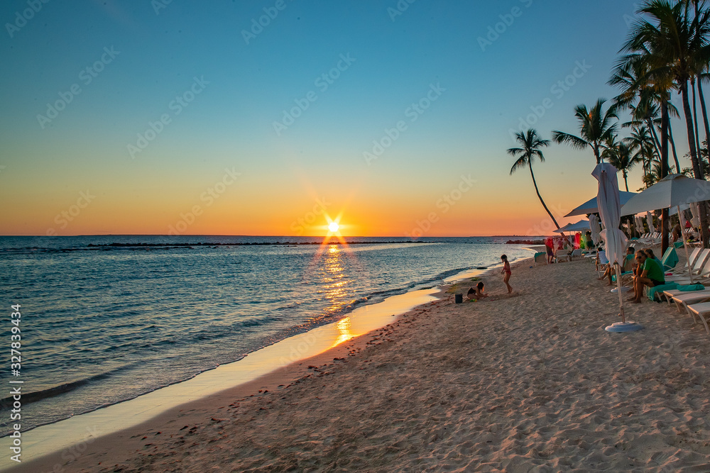 Fototapeta premium sunset on the beach with kids