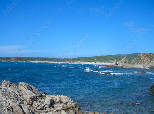 beaches in Sardinia with granite rocks with blue sea