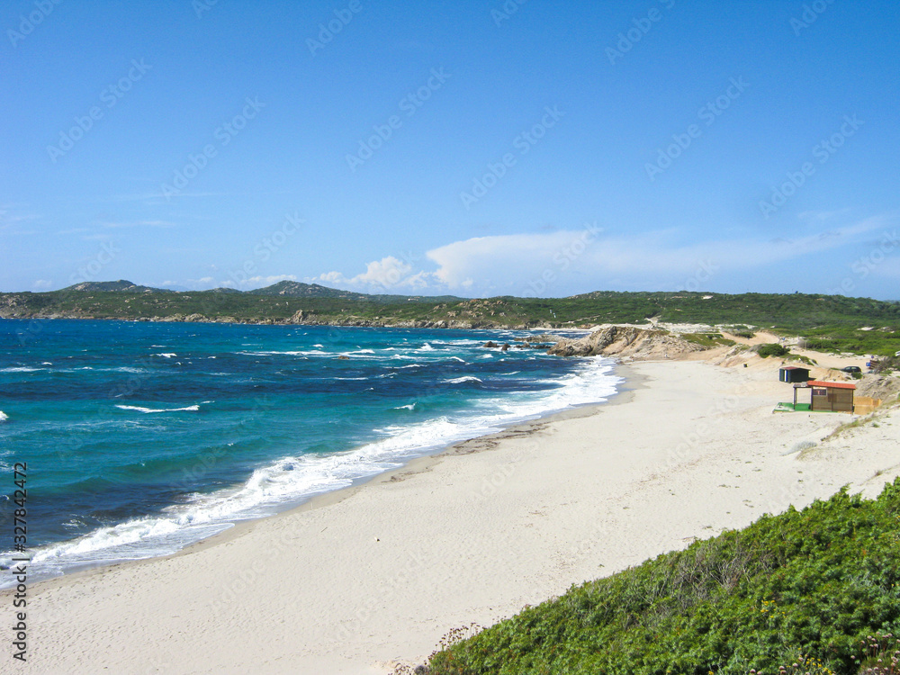 splendid panorama from the valley of the moon in sardinia with its granite rocks and the turquoise sea in the background