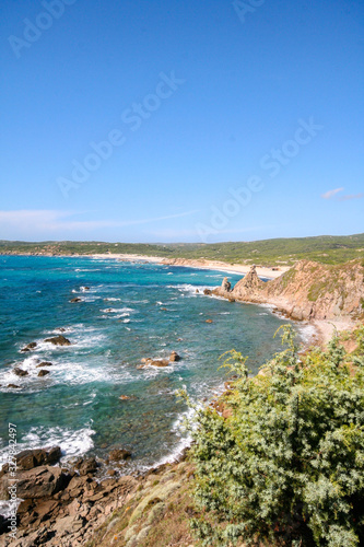 splendid panorama from the valley of the moon in sardinia with its granite rocks and the turquoise sea in the background