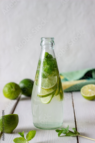Homemade lemonade with lime and mint. Cold drinks. Healthy eating. Diet.