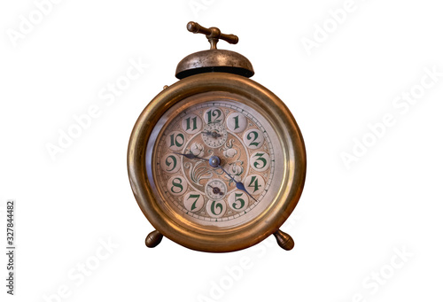 Old alarm clock with bell on the top, isolated, europe