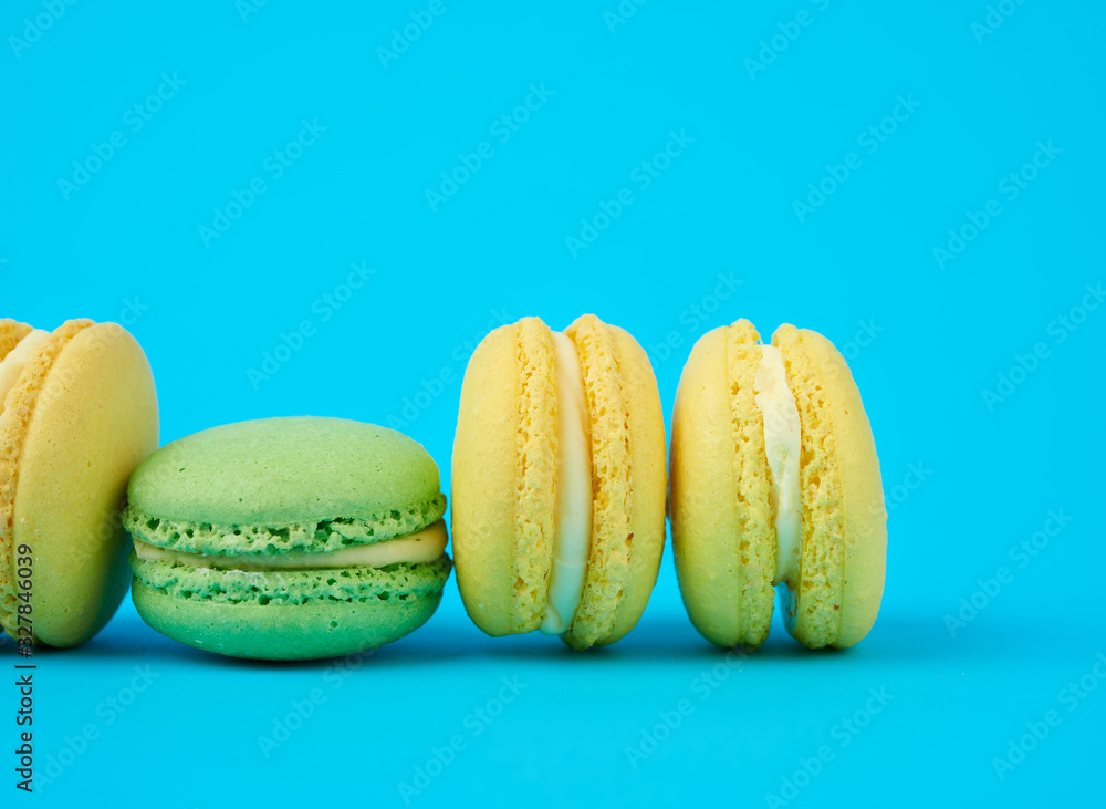 yellow and green round almond flour cakes macarons with cream yellow and green round almond flour cakes macarons with cream