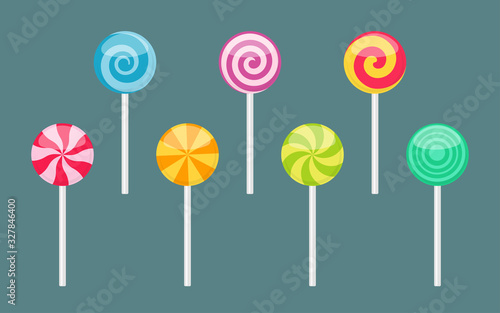 Murais de parede Set of lollipop sweet colorful candies with spiral and ray patterns