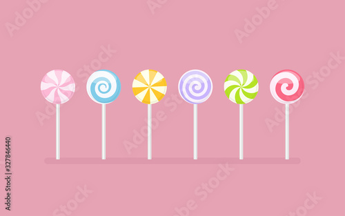 Set of pastel colored lollipop sweet candies. Vector illustration on pink background