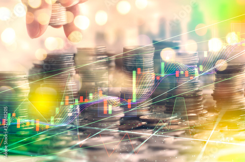 Stock market digital graph chart on LED display concept. A large display of daily stock market price and quotation. Indicator financial forex trade education background.  coins for finance concept
