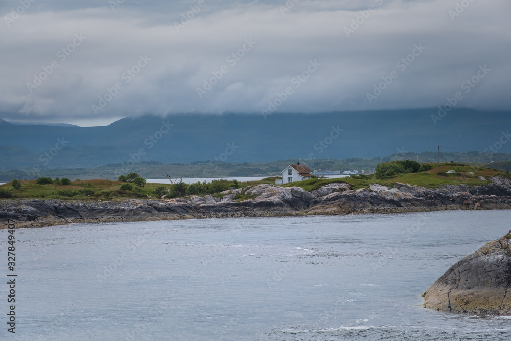 ATLANTIC ROAD, NORWAY - July , 2019: Angler in fishing boat on sea, Atlantic road in Norway Europe. Norwegian national scenic route. Tourist attraction.