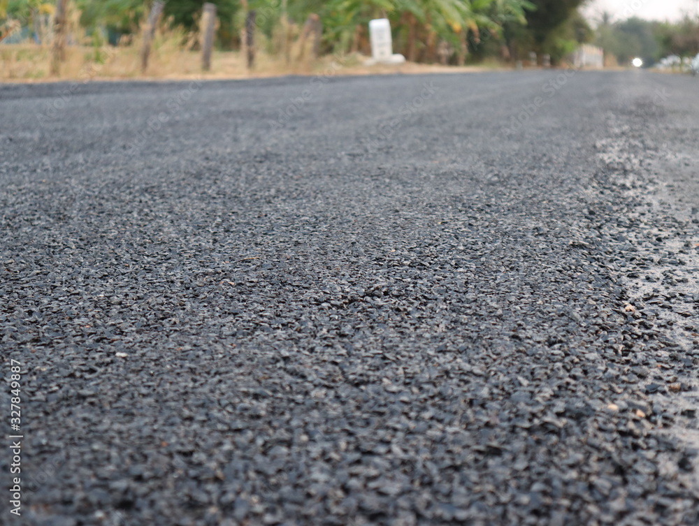 Close-up asphalt at the road under construction. Close-up asphalt at the road under construction.