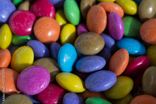 Multi-colored sweets, jelly beans background.