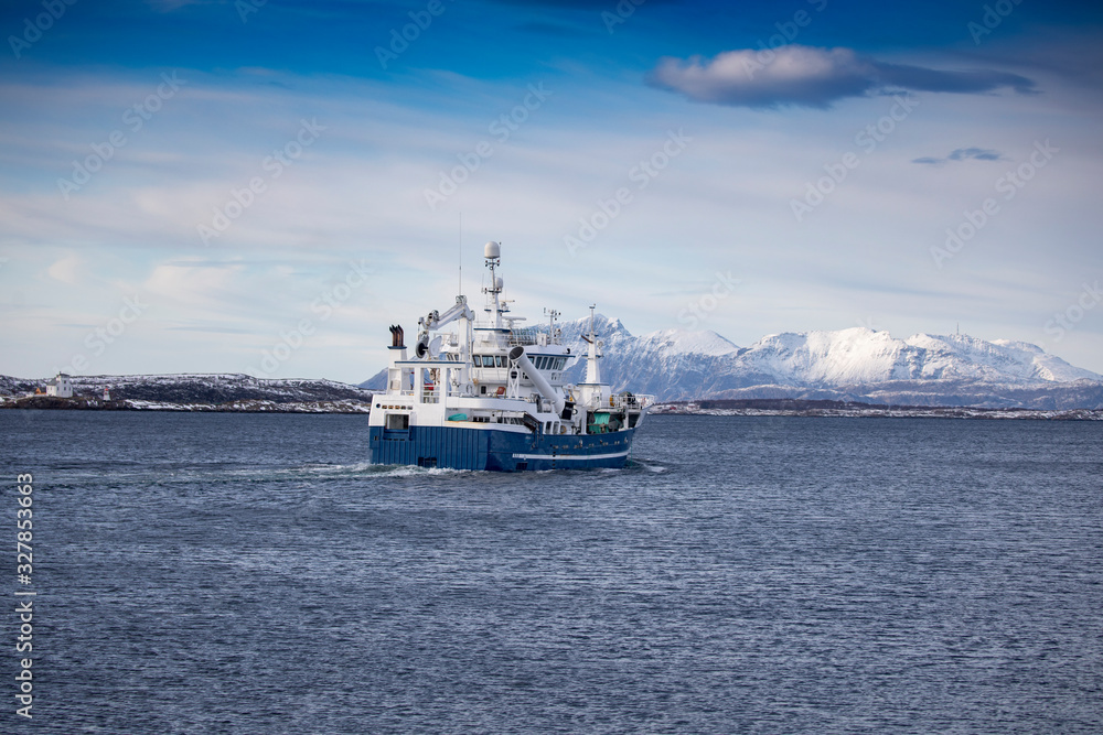 Fishing boat through Brønnøysundet, Nordland county Fishing boat through Brønnøysundet, Nordland county