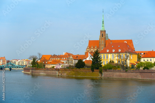 Wroclaw, Poland. Cityscape of old town, view at Tumski island on the Oder river and Cathedral of St John the Baptist.