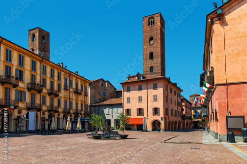 Fototapeta Naklejka Na Ścianę i Meble -  Old town square and medieval towers in Alba, Italy.