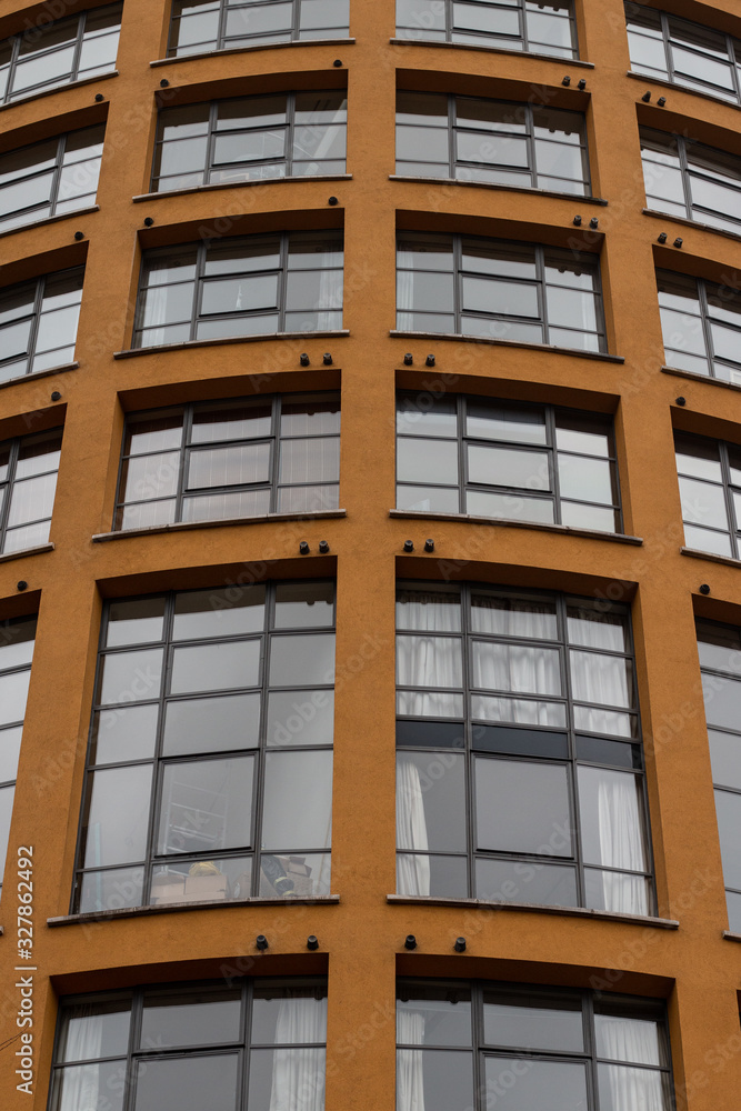 Obraz premium orange building windows