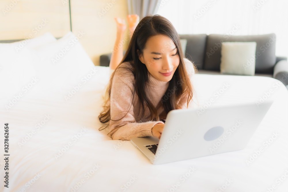 Portrait beautiful young asian woman using laptop for working Portrait beautiful young asian woman using laptop for working