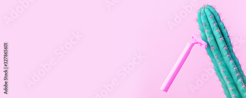 Canvas Print Concept of woman female shaving: pink razer on a pink background shave a cactus,