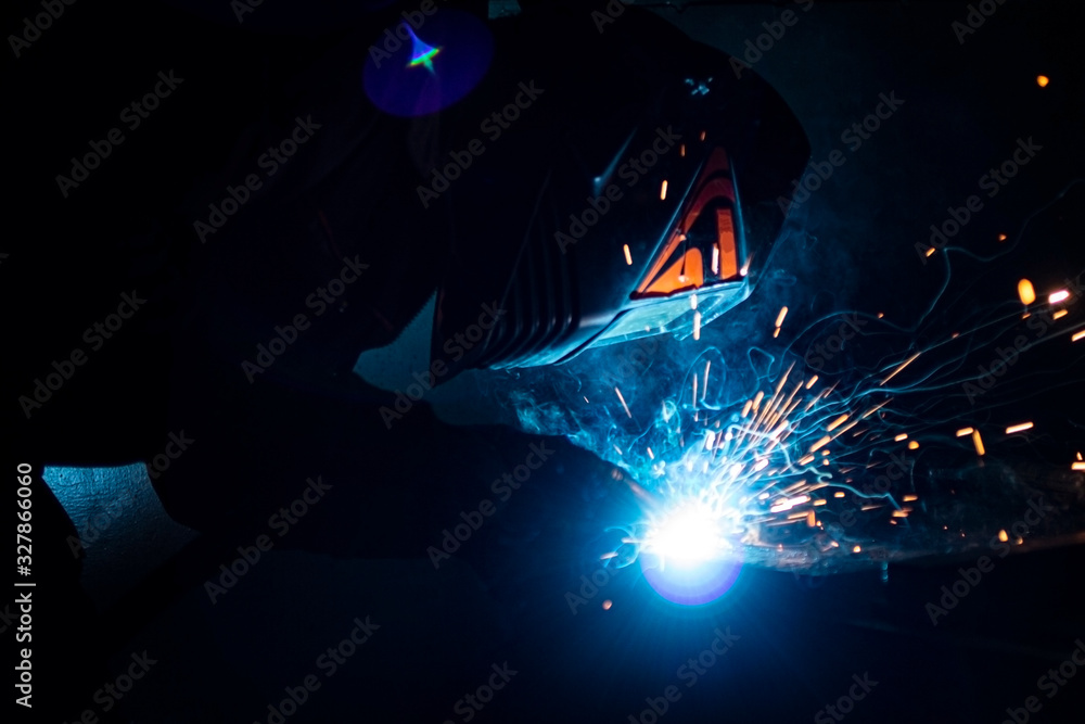 .The process of welding metal in complete darkness. .The process of welding metal in complete darkness.