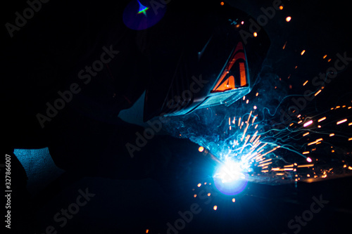 .The process of welding metal in complete darkness.