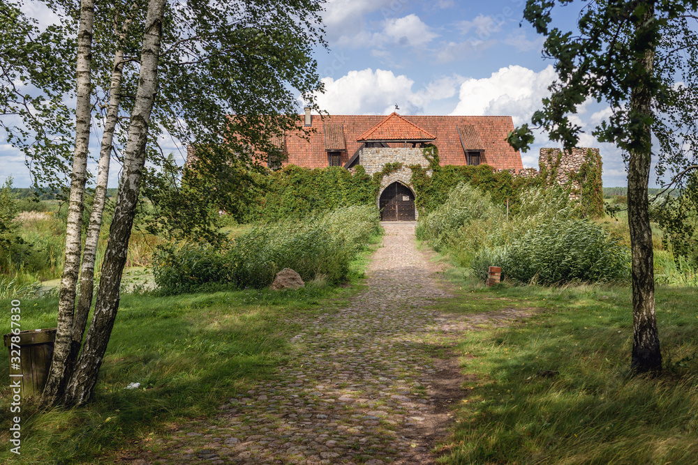 Fototapeta premium Replica of mediaeval castel in Kiermusy, small village in Podlasie region of Poland