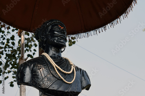 Statue of Indian warrior Chatrpati Shivaji Maharaj in old city of India photo