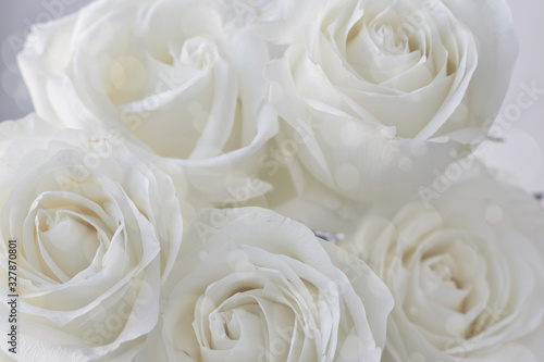 bouquet of white roses and boke