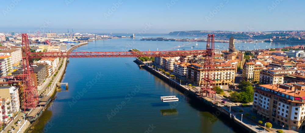Aerial view of modern Vizcaya bridge crossing  river at Portugalete