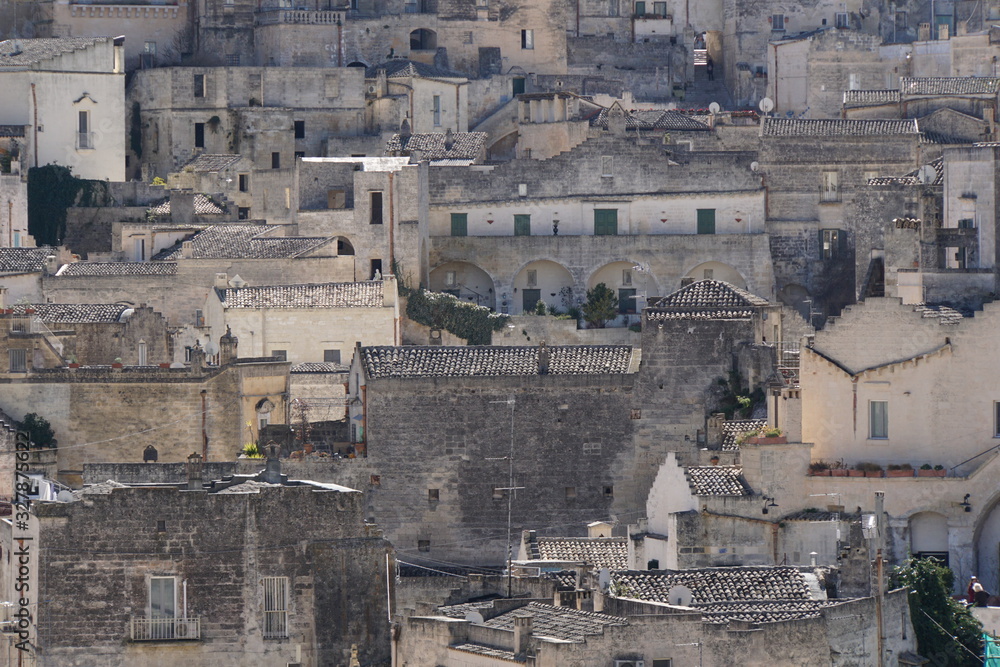 Detail view with Cobblestone streets in the Sassi di Matera a historic district in the city of Matera Detail view with Cobblestone streets in the Sassi di Matera a historic district in the city of Matera