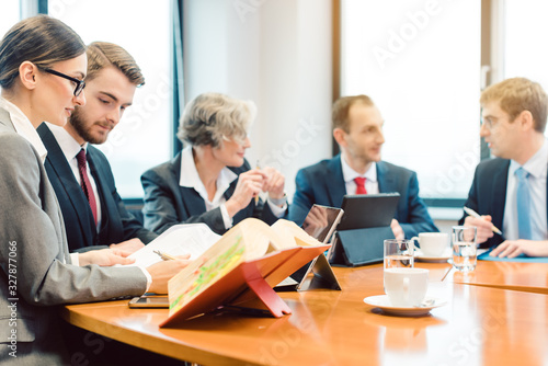 lawyer teams negotiating an agreement