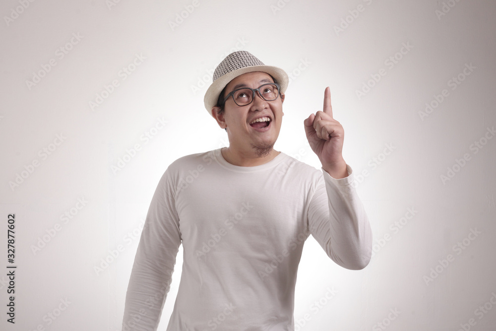 Young Man Thinking and Looking Up, Having Good Idea Young Man Thinking and Looking Up, Having Good Idea