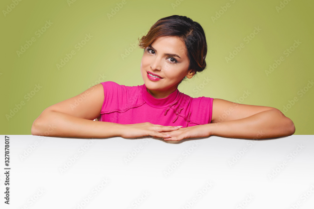 Young attractive woman presents advertising space