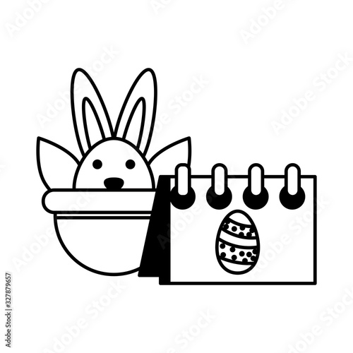 wicker basket with cute rabbit on white background