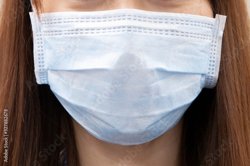 Close-up on Virus and PM2.5 Protection Mask on Woman Head