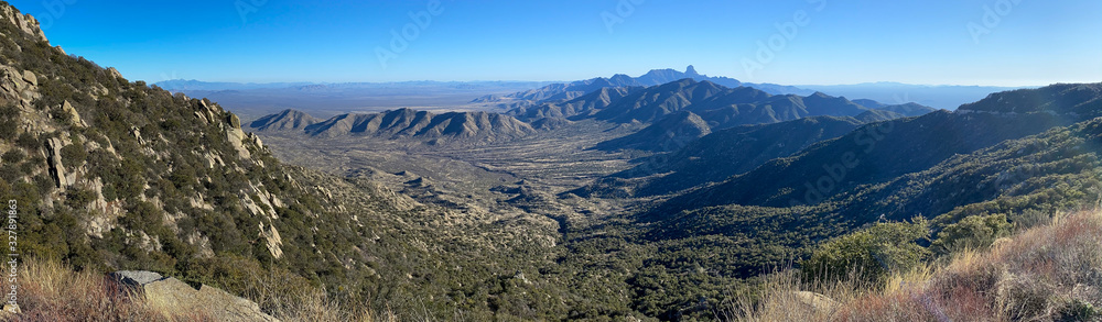 Panorama shot of Tucson Arizona desolate desert mountain ranges as seen from Kitt Peak Observatory 