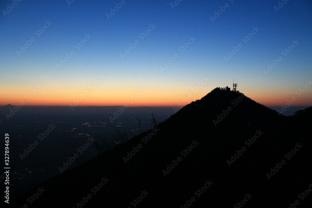 Gradation of Colors at Sunset with Silhouette of a Mountain