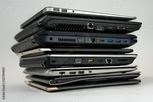 Stack of laptops on top of eachother. photo