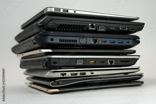 Stack of laptops on top of eachother.