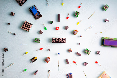 Micro electronics arduino DIY components on a light background, top view photo