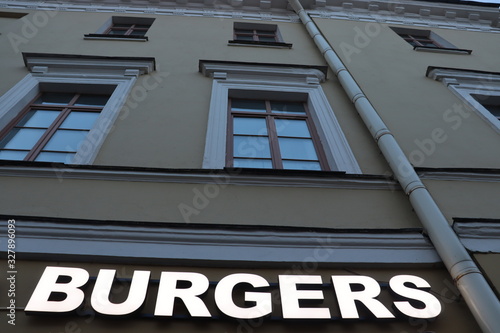 burgers symbol on building wall