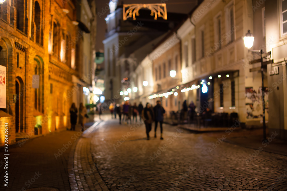 Pedestrianized street in the evening blurred background