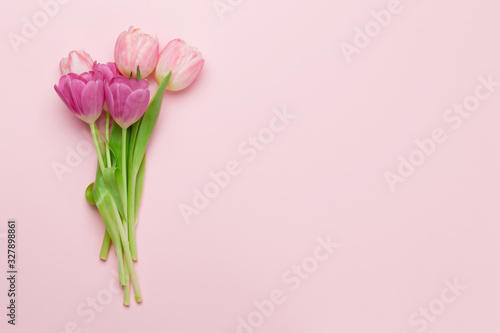 Easter greeting card with spring tulips © karandaev