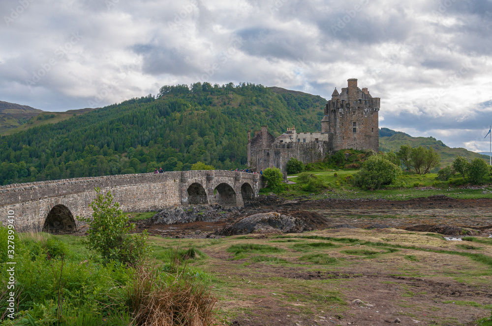 View of the bridge of Eilean Donan Castle. Concept: mysterious and symbolic places in Scotland