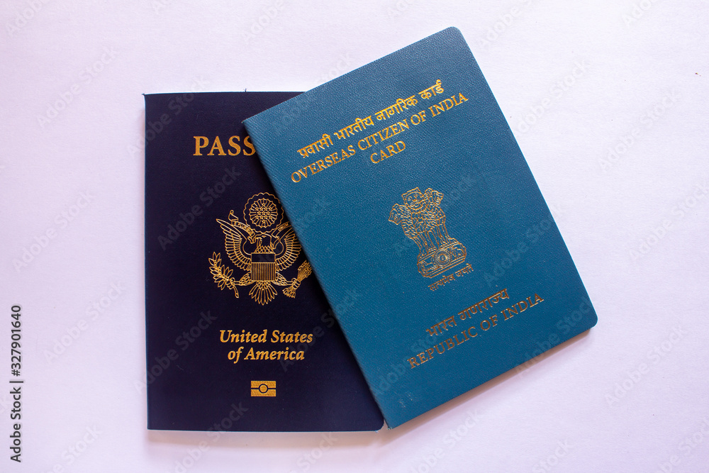 View of Overseas Citizen of India Card issued to non resident Indians along with US Passport. Travel document. View of Overseas Citizen of India Card issued to non resident Indians along with US Passport. Travel document.